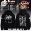 Black hoodie with The Strokes band logo on front! Back has white doodle graphics with text 