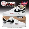 Custom white sneakers with black swoosh, The Strokes band photo, and text 'Rocks Awaits The World 2026' in red and black!