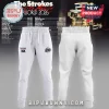 White sweatpants with The Strokes The Odds Awaits World 2026 tour logo in black and red text on the thigh!