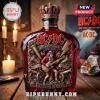 AC/DC 53rd anniversary red glass bottle with Angus Young guitar player graphic and gold cannon details!