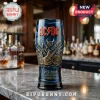 Blue glass beer pint with metallic AC/DC logo, guitar, and amp design reading 1973-2026 53rd Anniversary Edition!