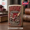 Gold and red AC/DC 53rd Anniversary 1973-2026 lighter, retro embossed Angus Young, 
