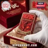 Red ornate AC/DC 53rd Anniversary lighter, gold accents, guitarist, lightning bolts, text 'FOR THOSE ABOUT TO ROCK 1973-2026'!
