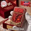 Red AC/DC 53rd Anniversary lighter featuring Angus Young, Sydney landmarks, 