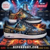 Custom AC/DC sneakers with blue lightning, gold accents, Angus Young graphics, and text reading Back In Black Highway To Hell!