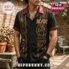 Black button-down short sleeve shirt with AC/DC band graphics, gold guitar, skull, and For Those About To Rock text print!