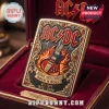 Gold lighter with embossed AC/DC logo, flaming guitar, and High Voltage Rock N Roll text in a red velvet display box!