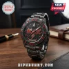 Dark grey AC/DC rock band watch with red lightning bolts, red gem accents, silver bell, and 