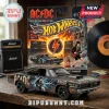 Black AC/DC Hot Wheels '70 Dodge Charger R/T diecast car featuring Angus Young, lightning, and AC/DC, HIGH VOLTAGE, ROCK 'N' ROLL DAMNATION text!
