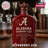 Red ceramic whiskey decanter featuring Alabama Crimson Tide logo, text 134th Anniversary Edition 1892-2026, and crown top.!