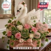Plush swan with AKA text, pink roses, ivy, and heart accents in pink and green colors for Alpha Kappa Alpha members!