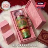 Alpha Kappa Alpha Juneteenth themed insulated tumbler with gold handle and straw in a pink gift box!