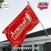 Red Arsenal FC Champions 25/26 flag featuring gold cannons, a Premier League trophy, and text on a house exterior!