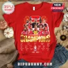 Red Arsenal FC champions t-shirt with player photos, gold text, and signatures on a burlap background!