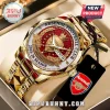 Gold Arsenal FC commemorative watch with red dial, crest, and 2025-26 season text in a display box!
