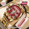 Gold Arsenal FC Champions watch, red dial, silver trophy, Big Ben graphic, text Premier League, North London, 23/24 Season!