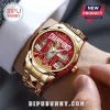 This gold watch features a red face with Arsenal FC Champions text and the Premier League trophy!