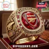 Gold championship ring featuring Arsenal FC logo with red gemstone and diamond accents engraved with Premier League text!