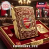 Gold and red Arsenal FC Zippo lighter in display case with Arsenal logo and Premier League Champions text!