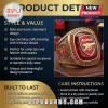 Gold championship-style ring with large red gem, white and red Arsenal F.C. cannon logo,