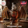 Bacardi Anejo Cuatro rum bottle shaped like a bat with gold label and brown liquid on a wooden table background!
