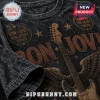 Vintage black acid wash Bon Jovi t-shirt featuring a guitar wings graphic and New Jersey 1983 text in distressed brown!