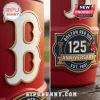 Close up of a red water cooler with a Boston 125th anniversary logo and a large white letter B!