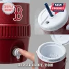 A red insulated water cooler with a logo and ice inside!