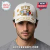 White distressed baseball cap with gold BTS text, colorful BT21 characters, and 'COSMIC FRIENDS' embroidered on the brim!