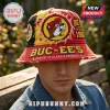 Distressed red and yellow Buc-ees bucket hat with beaver logo and Keepin It Clean and Friendly text on head!