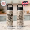 Tan water bottle, retro design, German Shepherd in cowboy hat, paw prints. Text: 