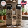 Tan thermal tumbler with brown paw prints, features a dog wearing a cowboy hat with 