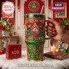 Red and green Delta Sigma Theta Juneteenth metal tumbler with crest and gold raised text featuring a straw and lid!