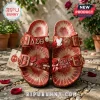 Red and cream tie-dye sandals with gold buckles, featuring Delta Sigma Theta Greek letters 