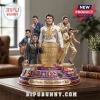 Multifigure Elvis Presley collectible statue with gold coin display and musical icons on a circular base!