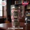 Stainless steel tumbler with pink tie-dye print, Elvis Presley guitar design, and metallic gear and banner graphics!