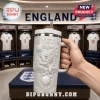 White embossed YETI tumbler featuring England soccer lion crest soccer balls and stadium art in a locker room background!