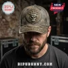 Distressed grey military cap with metallic skull, brass knuckles, 