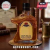 Amber glass bottle shaped like a crocodile head with gold 2025 NCAA National Champions label on an office desk!