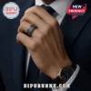 Blue and gold Masonic symbol ring with square, compass, 'G', and eye patterns on a man's finger!