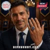 Man wearing a gold Masonic ring with blue stone, square and compass symbol, in a lodge setting!