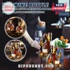 Amber glass turtle shaped wine bottle with cork stopper, showing a middle finger gesture, sitting on a wooden table!
