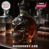 Gothic skull shaped glass liquor decanter with intricate metal ornate crown and skull design holding amber whiskey!