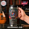 Stainless steel tumbler with Grateful Dead tie dye design, guitar graphic, and text What A Long Strange Trip It Is Been!