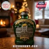 Green Packers 105th anniversary liquor bottle with Lambeau Field relief, cheese stopper, and 13 champions text detail!