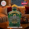 Green Packers 105th anniversary commemorative bottle with Lambeau Field relief, cheese stopper, and gold trophy details!