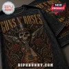 Black vintage washed Guns N Roses graphic tee with skull in top hat, revolvers, roses, and electric guitar print!