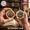 Gold Harry Potter 25th anniversary commemorative coins featuring Hogwarts castle and character collage! Text: Harry Potter 25 Years of Magic!