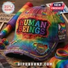 Distressed tie-dye pride baseball cap with rainbow HUMAN BEINGS embroidery and Together We Rise patch!