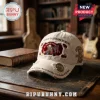Distressed white baseball cap; Iron Maiden Eddie skull holding British flag; 